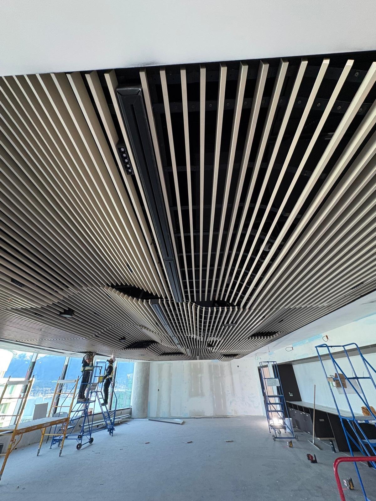 Decorative acoustic wood baffle ceiling
